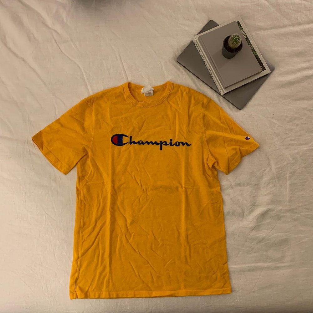 L Champion Yellow short sleeve T-Shirt.